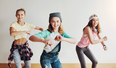 Dance, fun and group of children in studio for hip hop rehearsal for concert show with music....