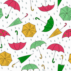 Pattern of drawings of colorful cartoon umbrellas. Open and closed umbrella, doodles. Seamless vector background.