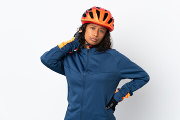 Teenager cyclist woman isolated on white background having doubts