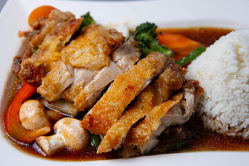 Asian fried duck with vegetables and coconut sauce