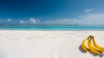 A bunch of bananas on a sunny beach in a summer vacation background reminiscent of tropical relaxation
