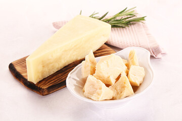 Chopped Italian hard parmesan cheese