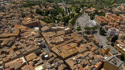 Aerial view of the Civic Tower in Piazza Plebiscito in Viterbo, Lazio, Italy. It is one of the symbols of the historic center of the city.