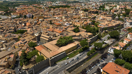 Aerial view of the historic center of Viterbo and its walls that separate it from the modern city....