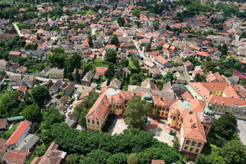 Aerial view of Sremski Karlovici town and Gymnasium building on sunny day. Serbia.