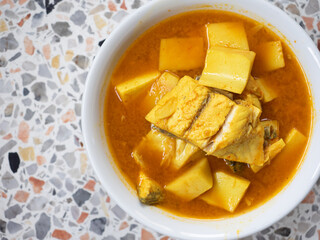 Southern Thai fish yellow curry with coconut shoots