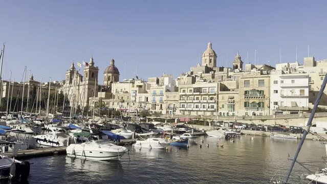 Move through three cities harbor birgu with sailboats, Malta