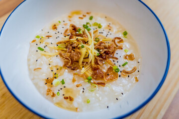 Rice porridge with caramelized onions and sesame seeds
