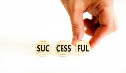 Successful symbol. Concept word Successful on beautiful wooden circles. Beautiful white table white background. Businessman hand. Business successful concept. Copy space.