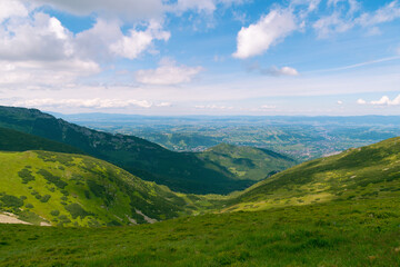 Beautiful mountain landscape overlooking the valley and the city. Tatra Mountains, Zakopane, Poland. Summer 2024.