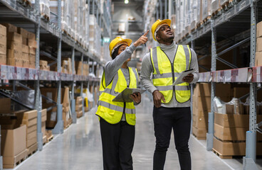 Portrait african american engineer team shipping order detail on tablet export and import,goods,factory,warehouse,international trade,transportation,cargo ship,logistic,distribution.business industry