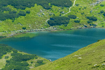 Top view of a small lake in the mountains.