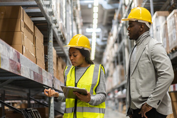 Portrait african american engineer team shipping order detail on tablet export and import,goods,factory,warehouse,international trade,transportation,cargo ship,logistic,distribution.business industry