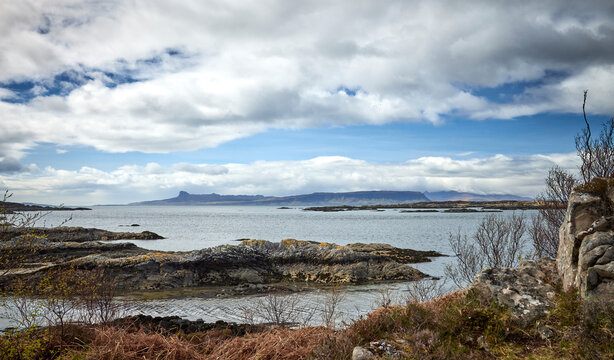 Looking west with a distant view of An Sgurr on Eigg. From the single track road to Rhu, Arisaig, Scotland