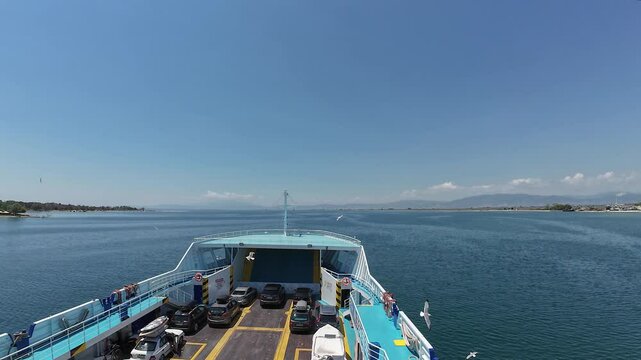 Hyper lapse of  passenger ferry boat cruising in the open sea. Time lapse of tourist transport boat from Keramoti to Thassos, Greece.