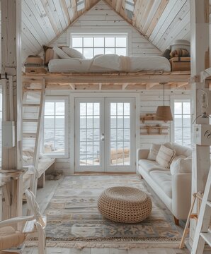 A classic coastal home interior with whitewashed walls, wooden accents, and a cozy loft bed