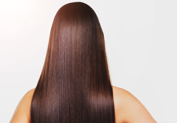 Back, hair care and woman with shine, beauty and cosmetics on white studio background. Glow, person and model with shampoo, healthy scalp or texture with salon, volume and growth with aesthetic