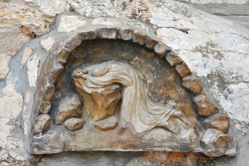Jesus prays to the Father on a rock in Jerusalem.