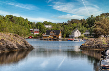 Fjord harbor on Boemlo in the Norwegian archipelago fjordland, Norway
