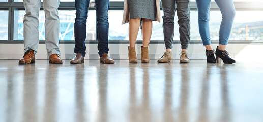 Business people, closeup and legs in workplace, shoes and creative agency for cooperation, waiting and group. Feet, footwear and employees in office, colleagues and startup for graphic designer
