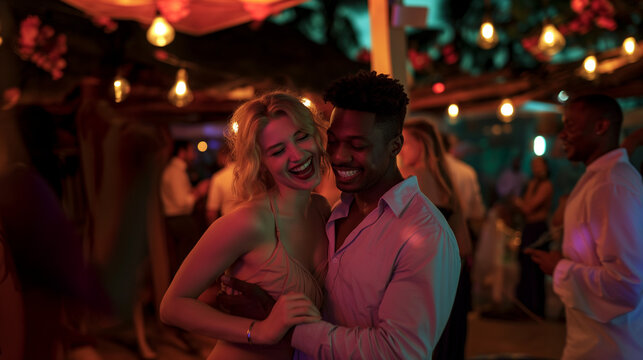 A woman pushes a man's hand away while dancing at a nightclub. Groping.