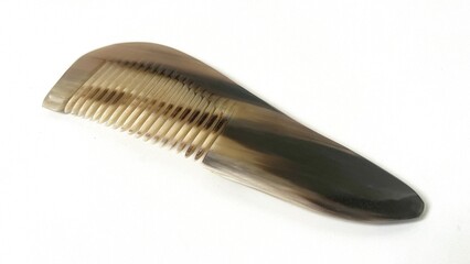 Gua sha Yak horn comb isolated on white background with copy space.