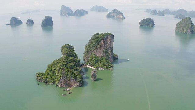 Aerial top view of Khao Phing Kan, Ko Ta Pu, Phang Nga, lush green trees from above in tropical forest in national park in summer season. Natural landscape background.