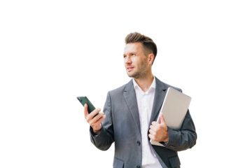 A businessman man in a suit uses a phone and writes a message.  cut out background