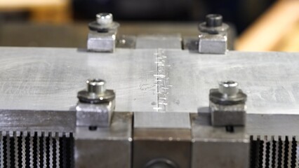 Close-up view of weld interface just before friction welding