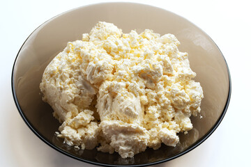 Natural cheese curd close-up on white background