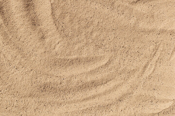 Text sand background. Beach sand texture as a background, top view.
