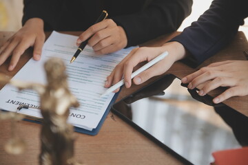 Lawyer, legal advisor, businessman brainstorming information on agreement details Business...