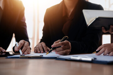 Lawyer, legal advisor, businessman brainstorming information on agreement details Business...