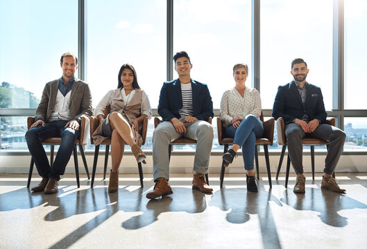 Portrait, people and waiting room for interview in workplace, we are hiring and process of employment. Group, unity and candidates for recruitment opportunity, human resources and join us in meeting