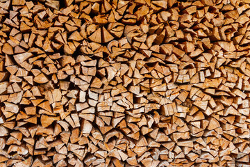 Background of the stacked dry chopped firewood