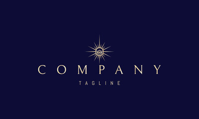 A vector golden logo with an abstract image of a shining sun with a moon in the middle.