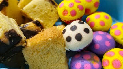 Colorful cake and polka dot cup cakes