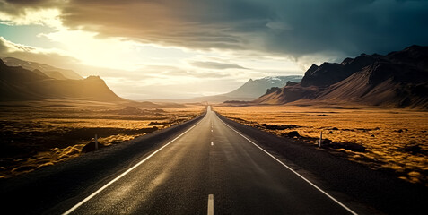 A long road with a few trees in the background.