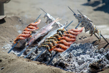 Traditional seafood cooking (espetos) is deeply rooted in Malaga's fishing heritage