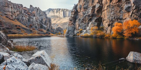 High-Resolution AI-Generated Wallpaper of Rocky Mountain Lake in Beautiful Autumn Scenery with Towering Cliffs and Clear Dark Waters, Reflecting Nature's Seasonal Changes,No one, vacation, vacation, h