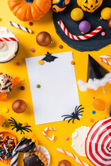 Fototapeta premium Halloween background flat lay with a blank space for text, festive decor