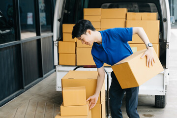 Asian courier delivery man searching the address on digital tablet.  near van outside the warehouse. This is a freight transportation
