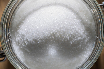 White sugar in particles super close up, macro