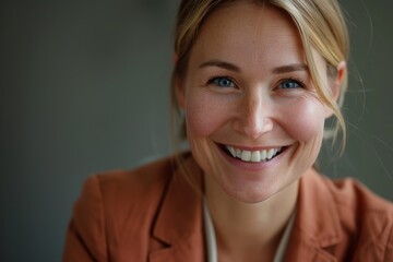 Portrait of a confident, warm-hearted businesswoman exuding kindness and charisma.