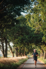 Obraz premium Senior man going for a run