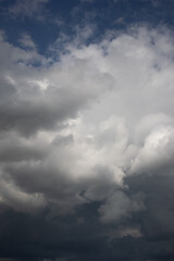 Blue sky. Beautiful Cumulus clouds flying across the sky,