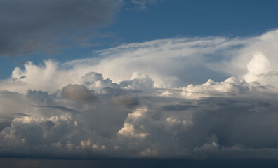 Blue sky. Beautiful Cumulus clouds flying across the sky,