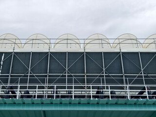 Ventilation pipes on the top of large industrial building