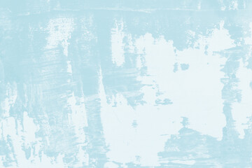 White Paint Covering A Blue Surface. Irregular White Brush Strokes On A Light Blue Background. Textured Faded Blue And White Background. Aging And Faded Wall. Grunge Brush Painted Texture.