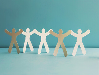 Paper cutout figures. Successful business team winner give high five. Team building. Copy space for text.